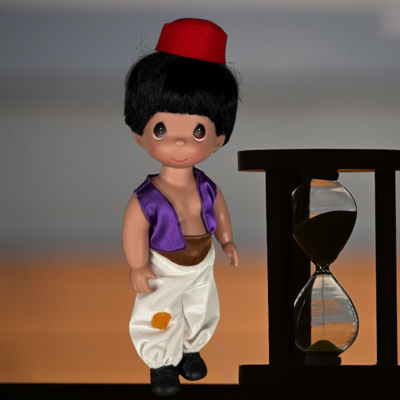 The Doll Maker 12-inch Aladdin doll wearing a red fez, purple vest, and white harem pants with a patch detail.
