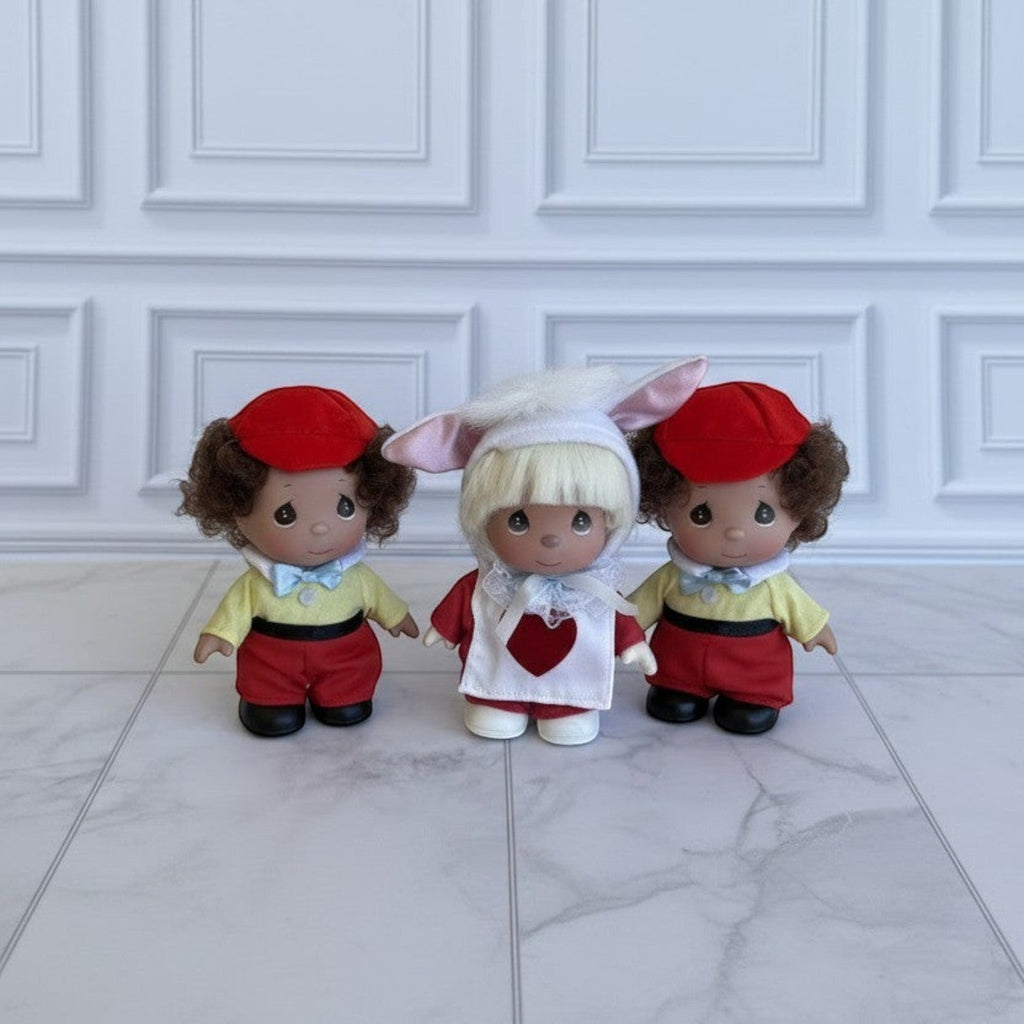 The Doll Maker 5-inch Alice in Wonderland collectible doll set featuring a white rabbit and Tweedledum and Tweedledee.