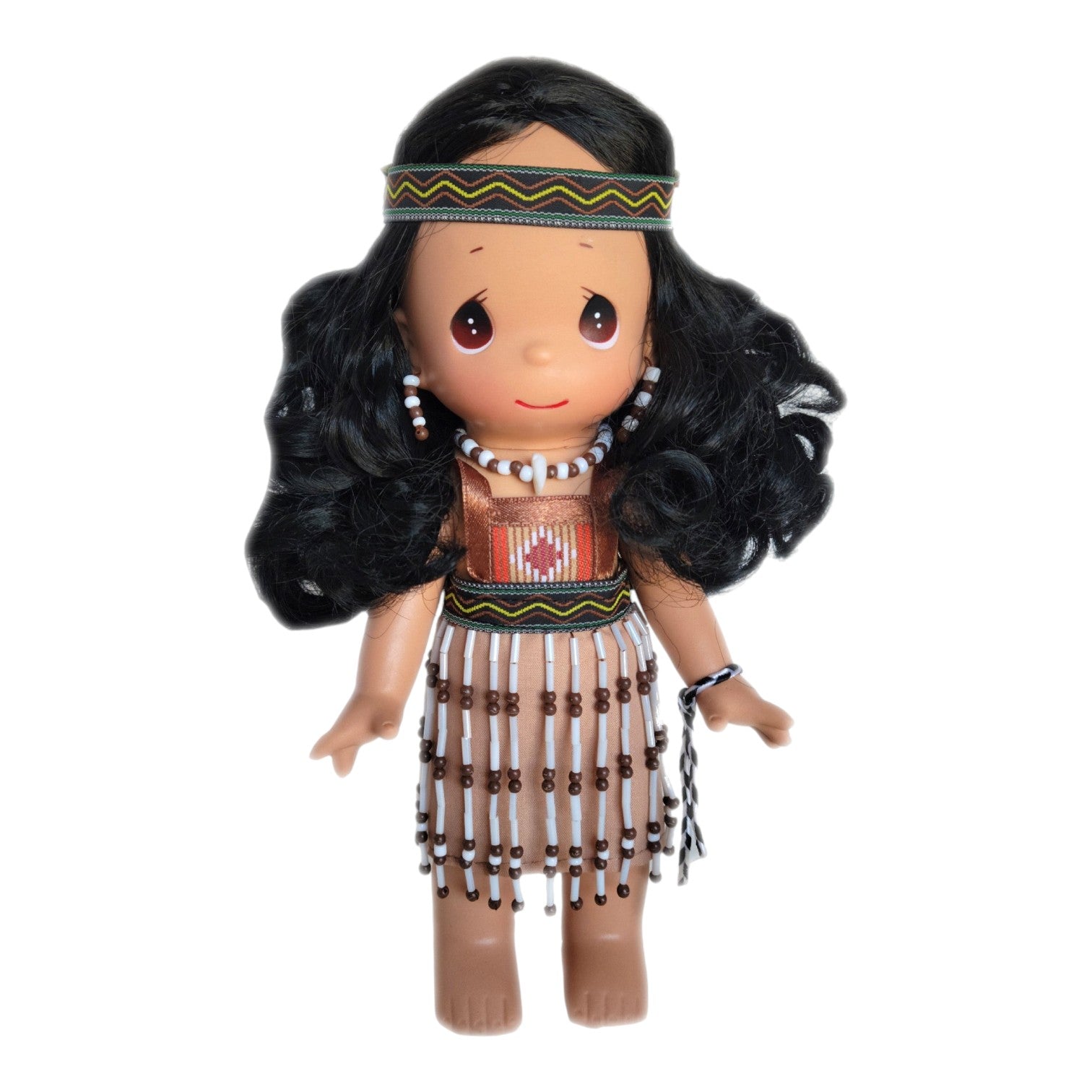 The Doll Maker Ariana 9-inch vinyl doll from New Zealand, wearing a traditional costume with beaded fringe and headband.