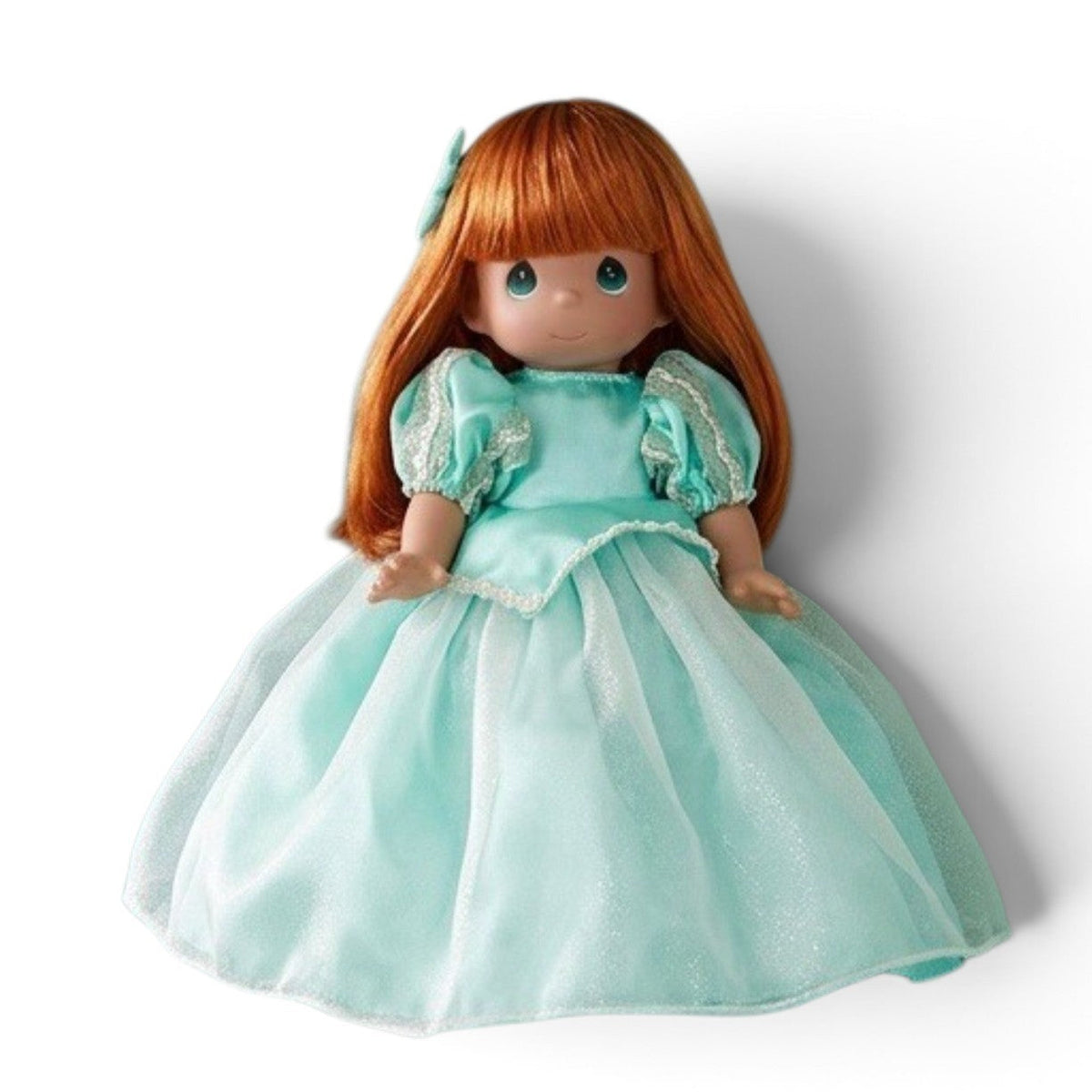 The Doll Maker 12-inch Ariel doll with long red hair wearing a shimmering teal gown with puff sleeves