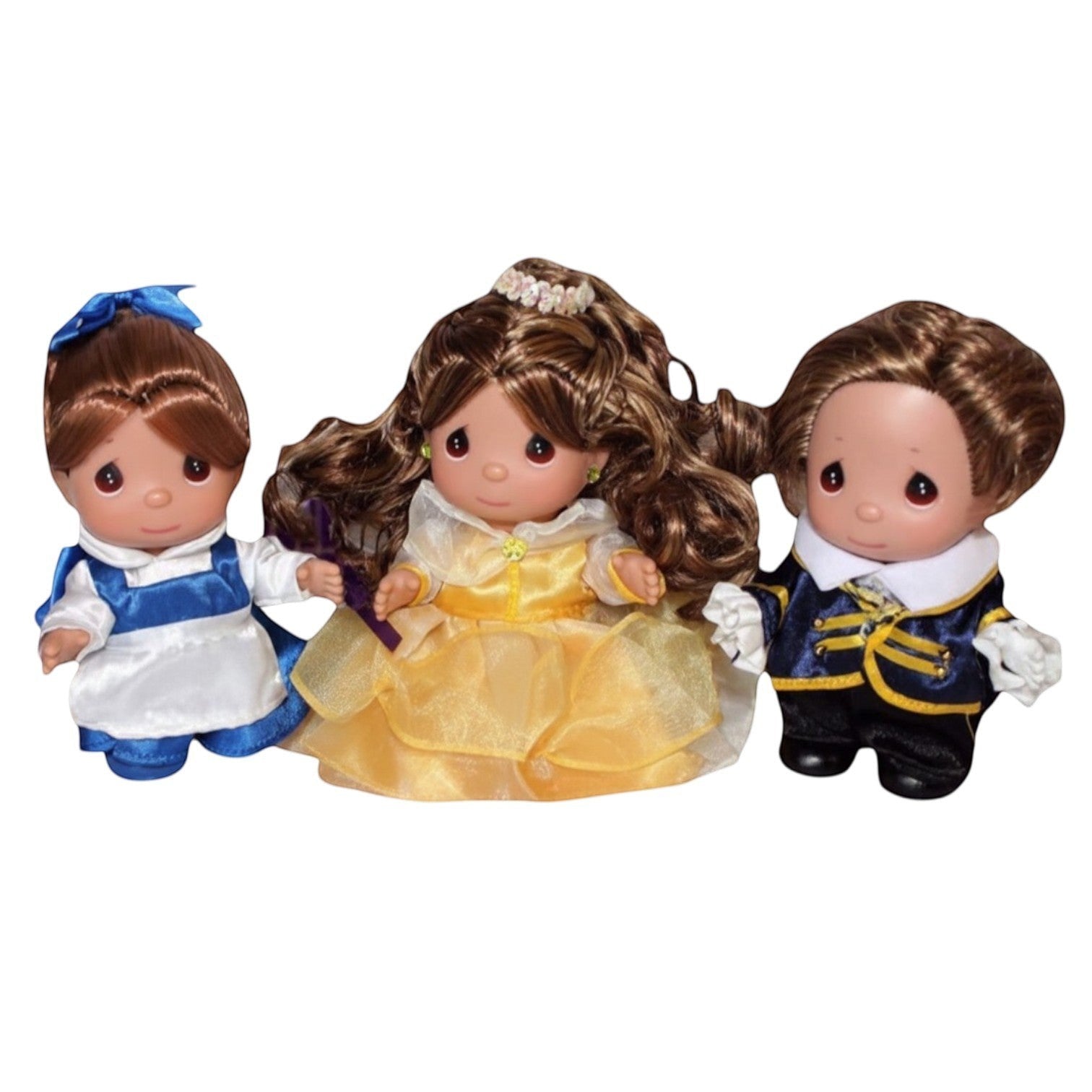 The Doll Maker 3-piece Beauty and the Beast doll set featuring Belle in yellow and blue dresses and the Beast.