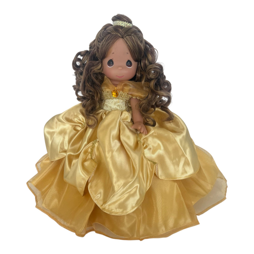 The Doll Maker 12-inch Belle doll with curly brown hair wearing an elegant gold satin ball gown