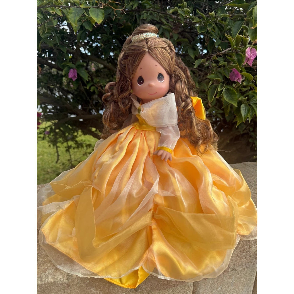 The Doll Maker 12-inch Belle doll wearing a yellow ball gown with sheer sleeves