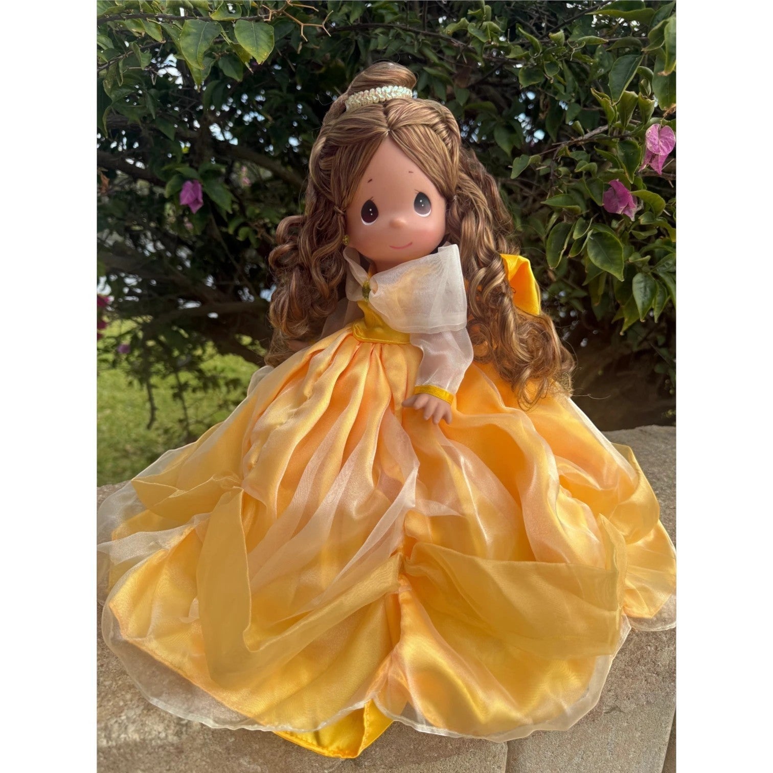 The Doll Maker 12-inch Belle doll wearing a yellow ball gown with sheer sleeves