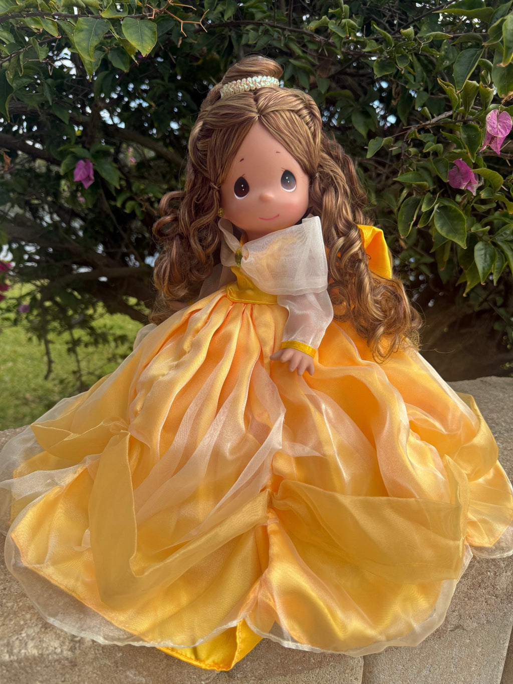 The Doll Maker 12-inch Belle doll wearing a yellow ball gown with sheer sleeves