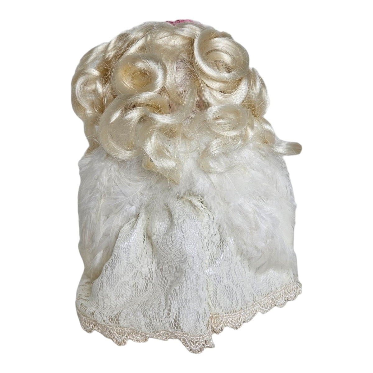 The Doll Maker 7-inch blonde angel doll featuring curly hair, white feathery wings, and a delicate lace dress.