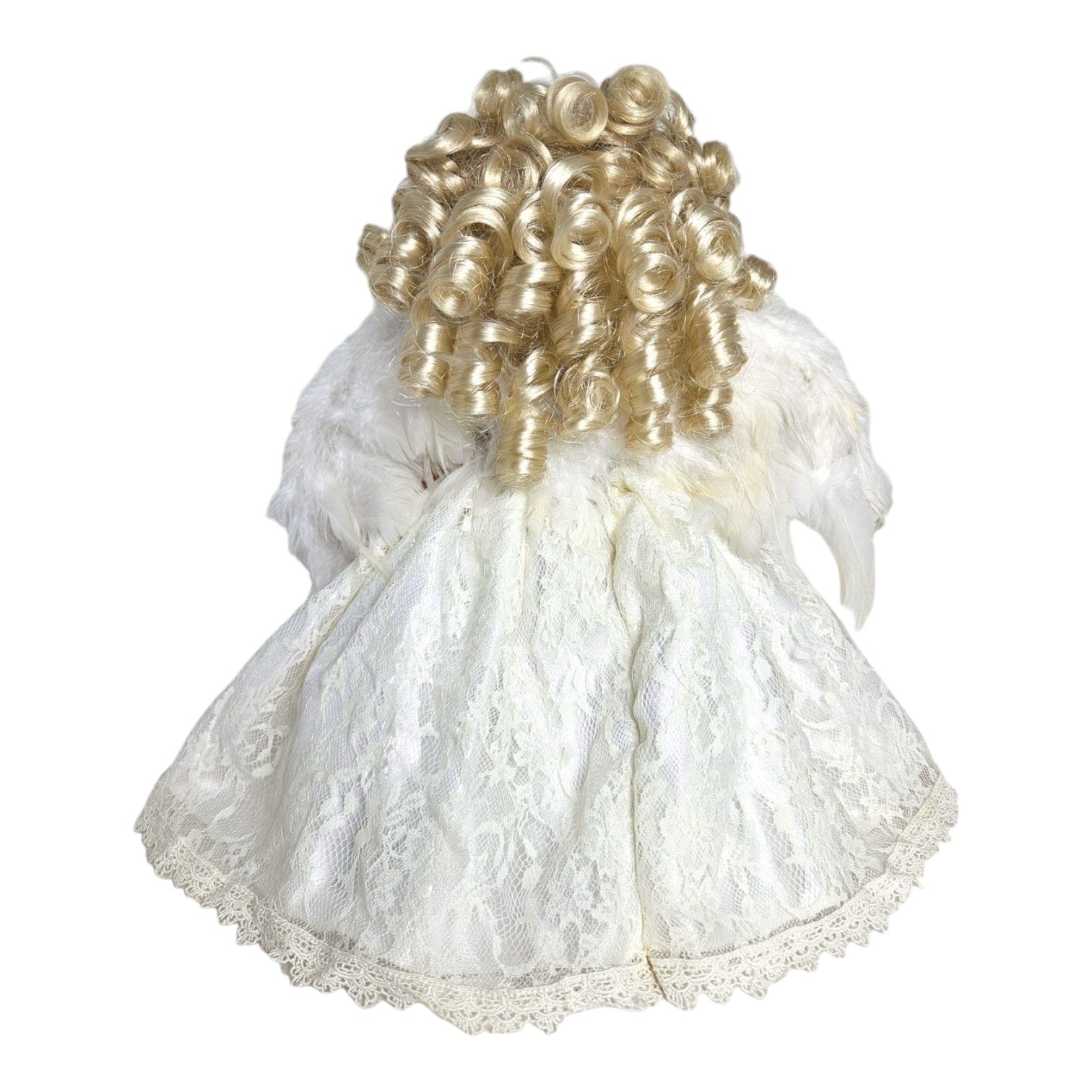 The Doll Maker blonde angel doll wearing a white lace dress with feathered wings, viewed from the back.