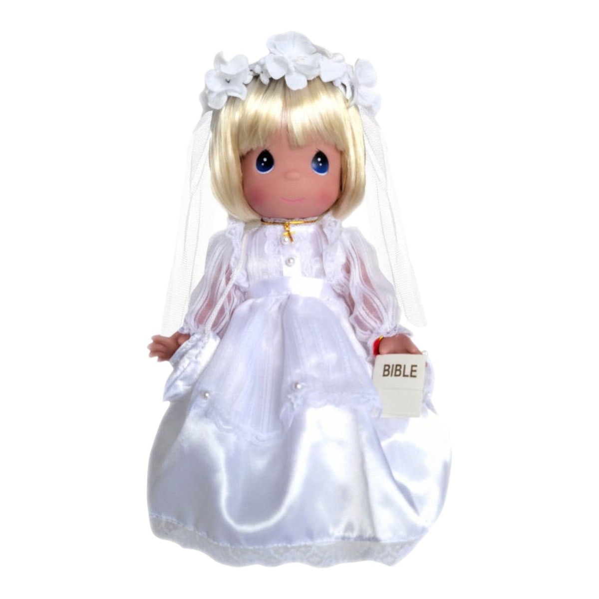 The Doll Maker 12-inch blonde communion doll wearing a white satin gown, veil, flower crown, and gold cross necklace.
