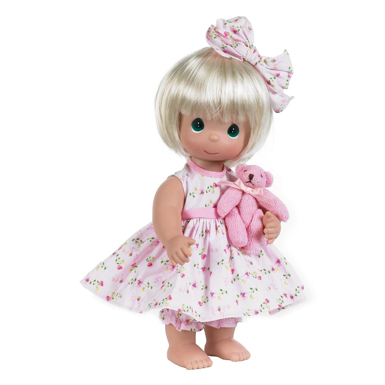 The Doll Maker Bear-Foot Blessings blonde vinyl doll in a floral dress holding a small pink teddy bear