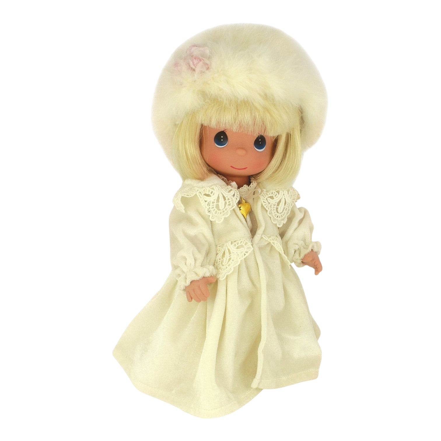 The Doll Maker Love and Tenderness blonde vinyl doll wearing a cream velvet coat and matching faux fur hat