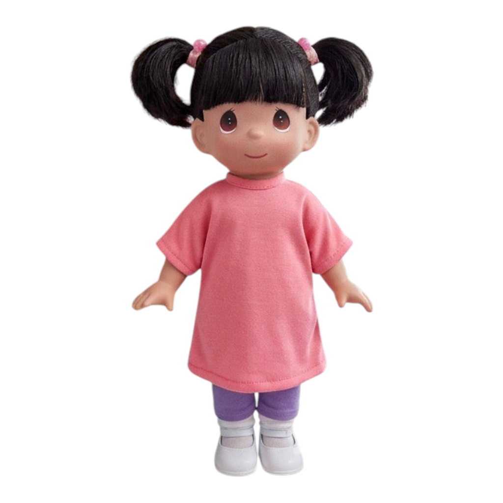 Precious Moments dolls The Doll Maker 12-inch Boo doll from Monsters Inc wearing a pink shirt, purple leggings, and white shoes.