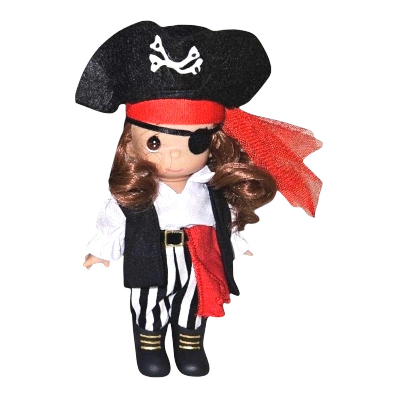 The Doll Maker 7-inch Precious Moments boy pirate doll wearing a black hat, eye patch, and striped trousers.