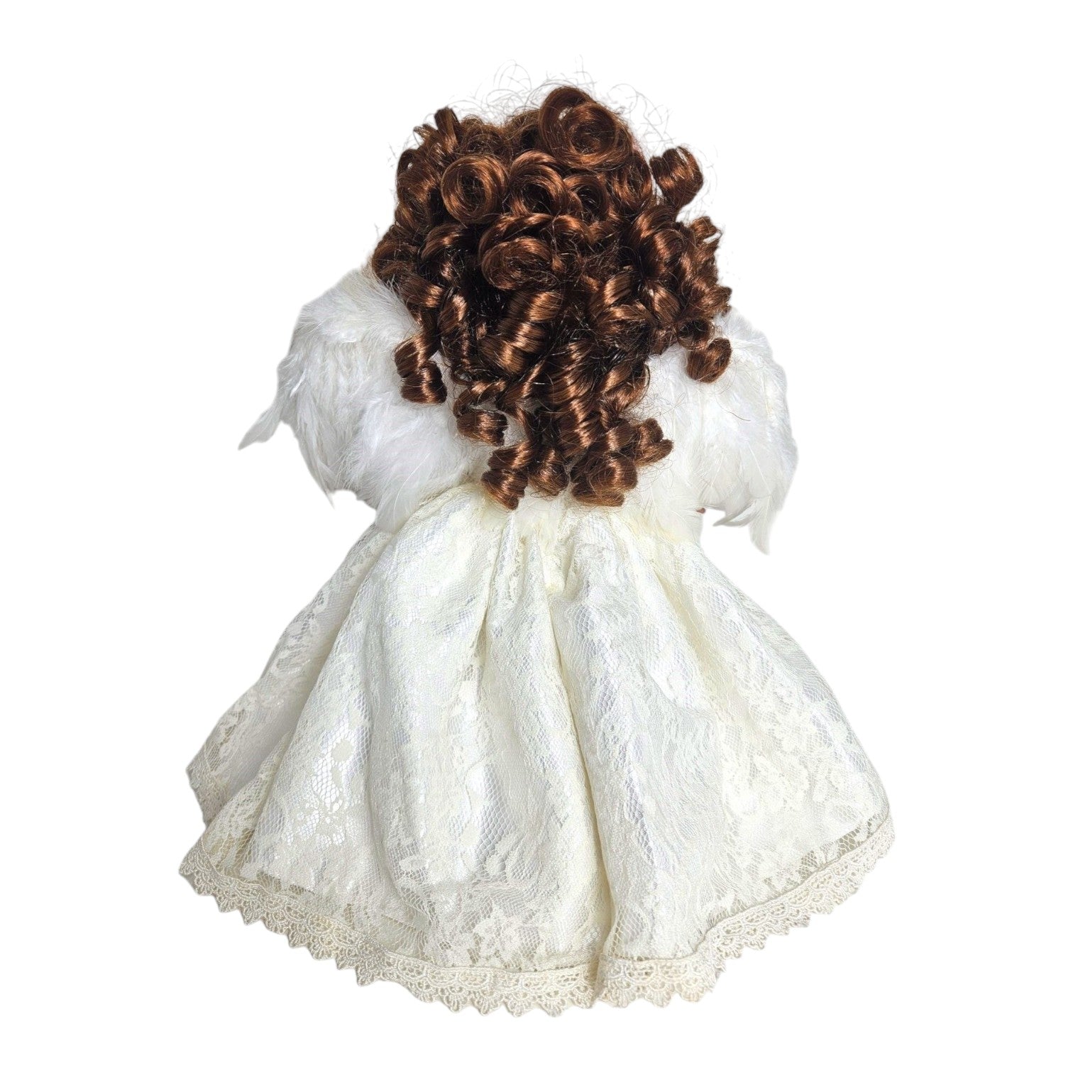 The Doll Maker 12-inch brunette angel doll wearing a white lace dress with feathered wings, back view.