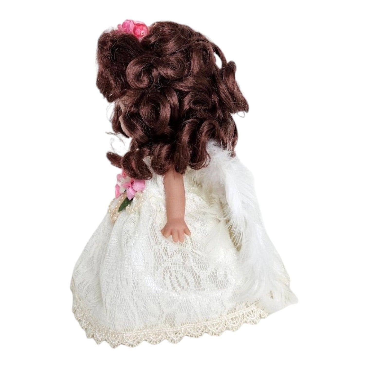 The Doll Maker 7-inch brunette angel doll wearing a white lace dress with pink flowers and feathered wings, side view