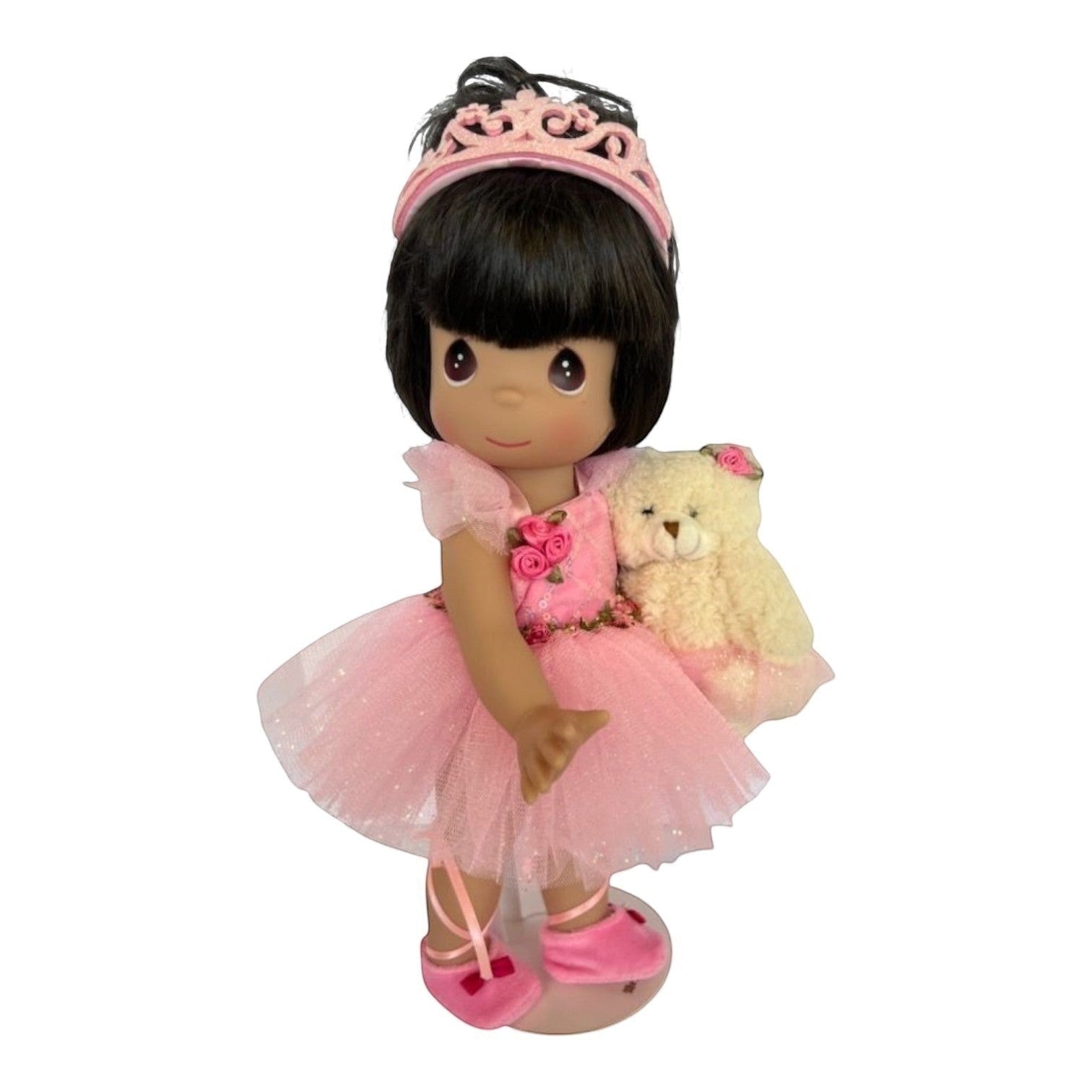 The Doll Maker 12-inch brunette ballerina doll wearing a pink tutu, tiara, and ballet slippers with a plush bear.