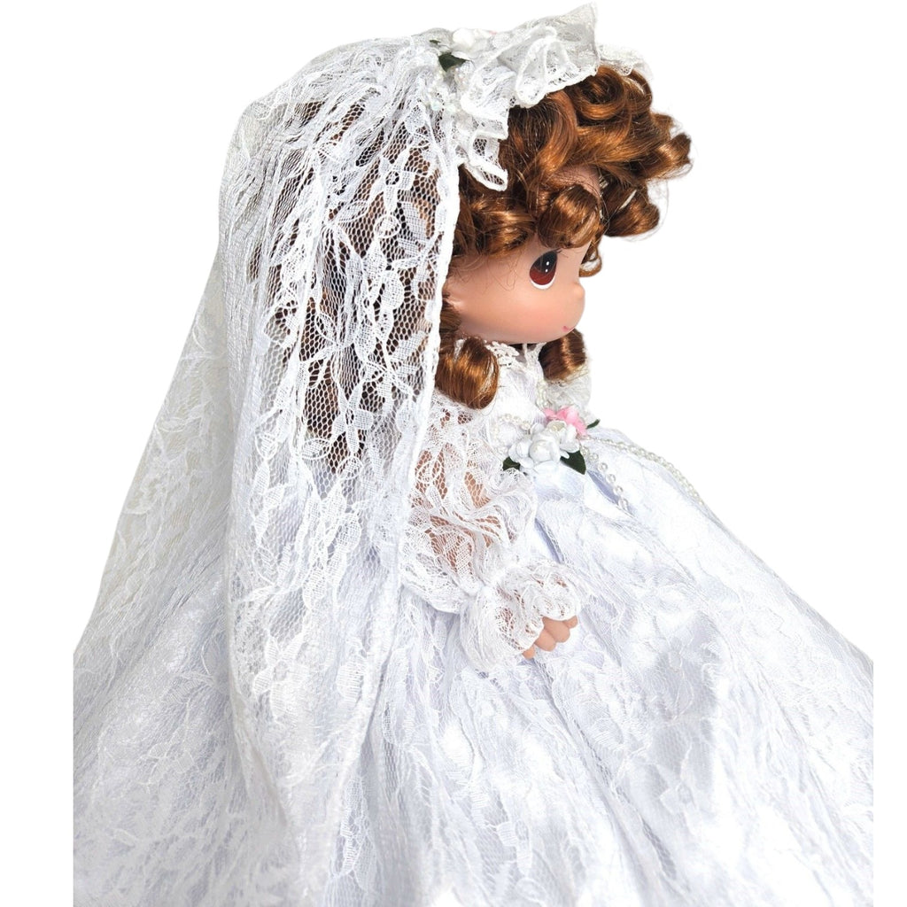 The Doll Maker Fairytale Come True brunette bride doll wearing a detailed white lace wedding dress and veil