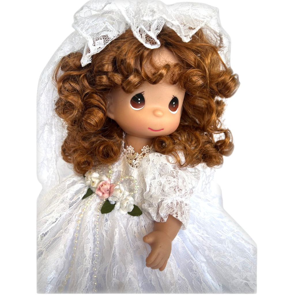 The Doll Maker Fairytale Come True brunette bride doll wearing a white lace wedding dress and veil with floral detail