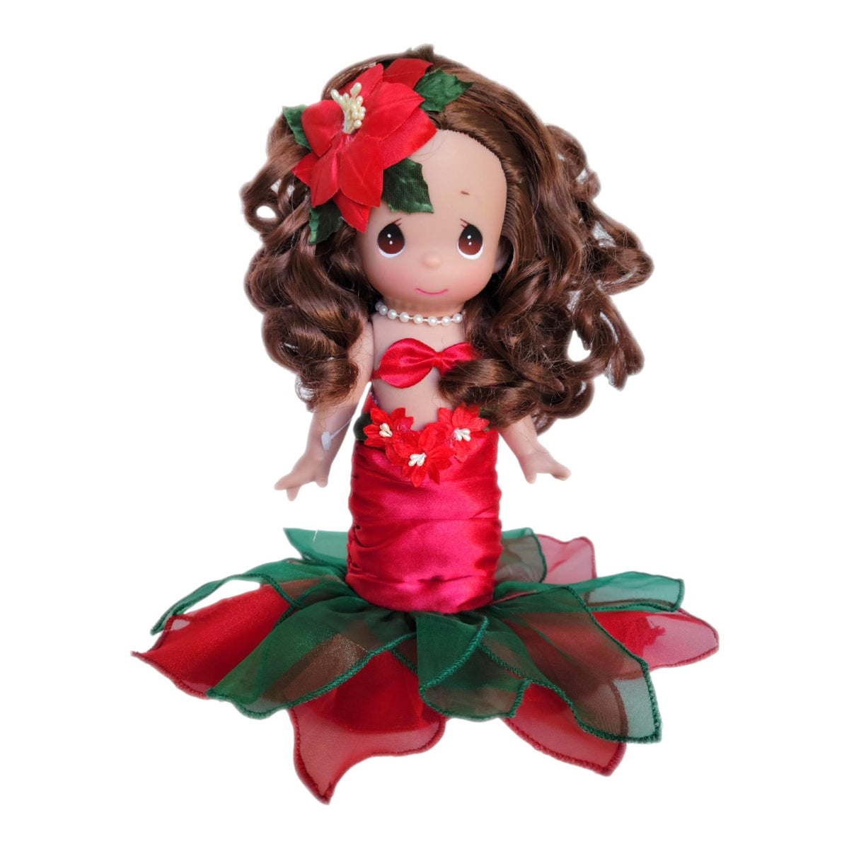 The Doll Maker 9-inch brunette Christmas mermaid vinyl doll wearing a red satin dress with poinsettia accents.