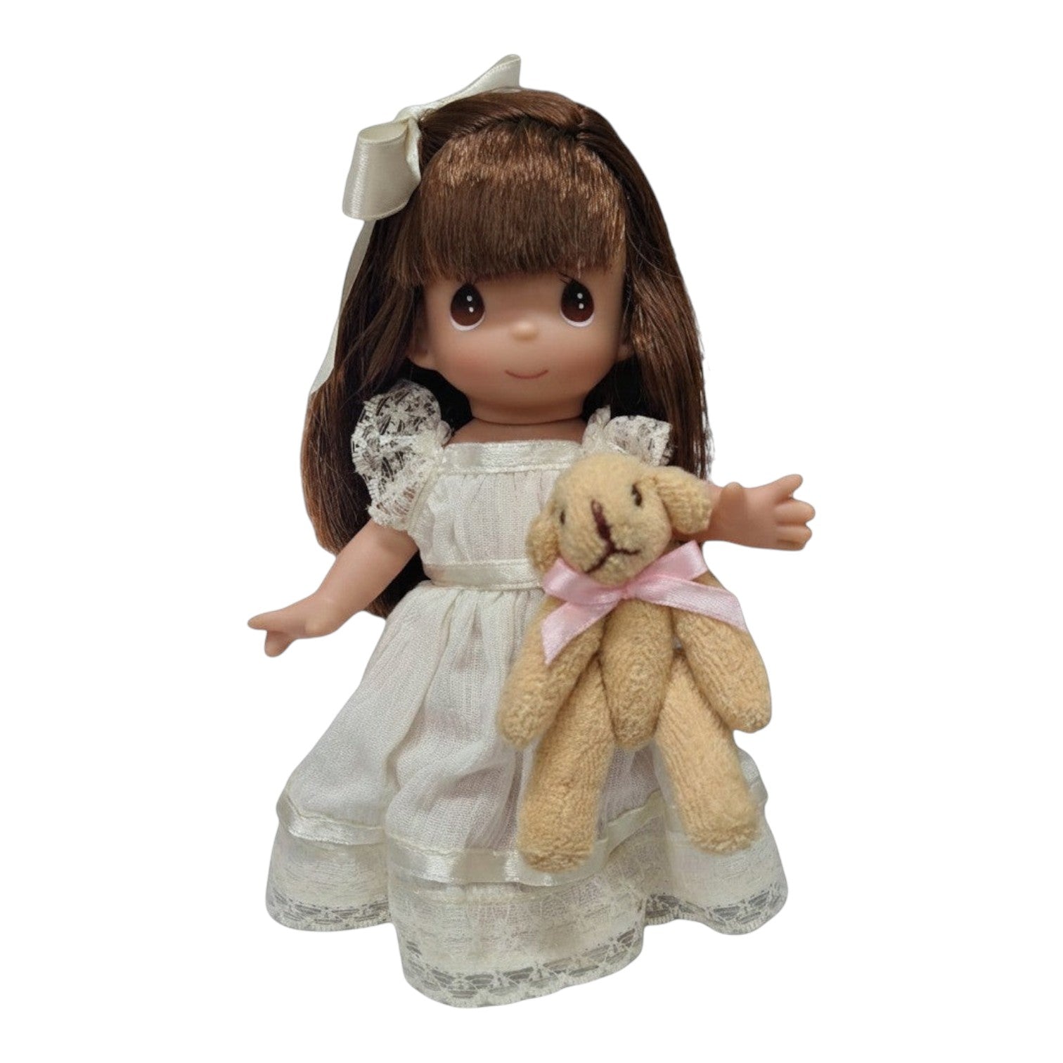 The Doll Maker Cherish Me Always brunette vinyl doll wearing an ivory lace gown and holding a small teddy bear