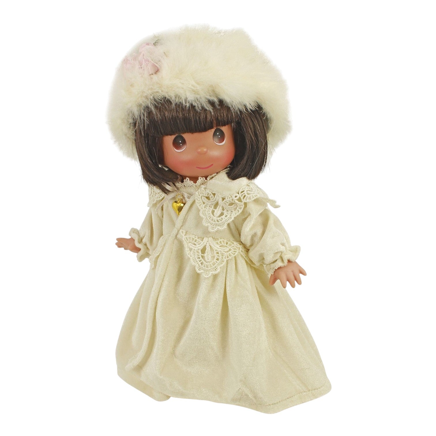 The Doll Maker Love and Tenderness brunette vinyl doll wearing a cream velvet dress and matching faux fur hat