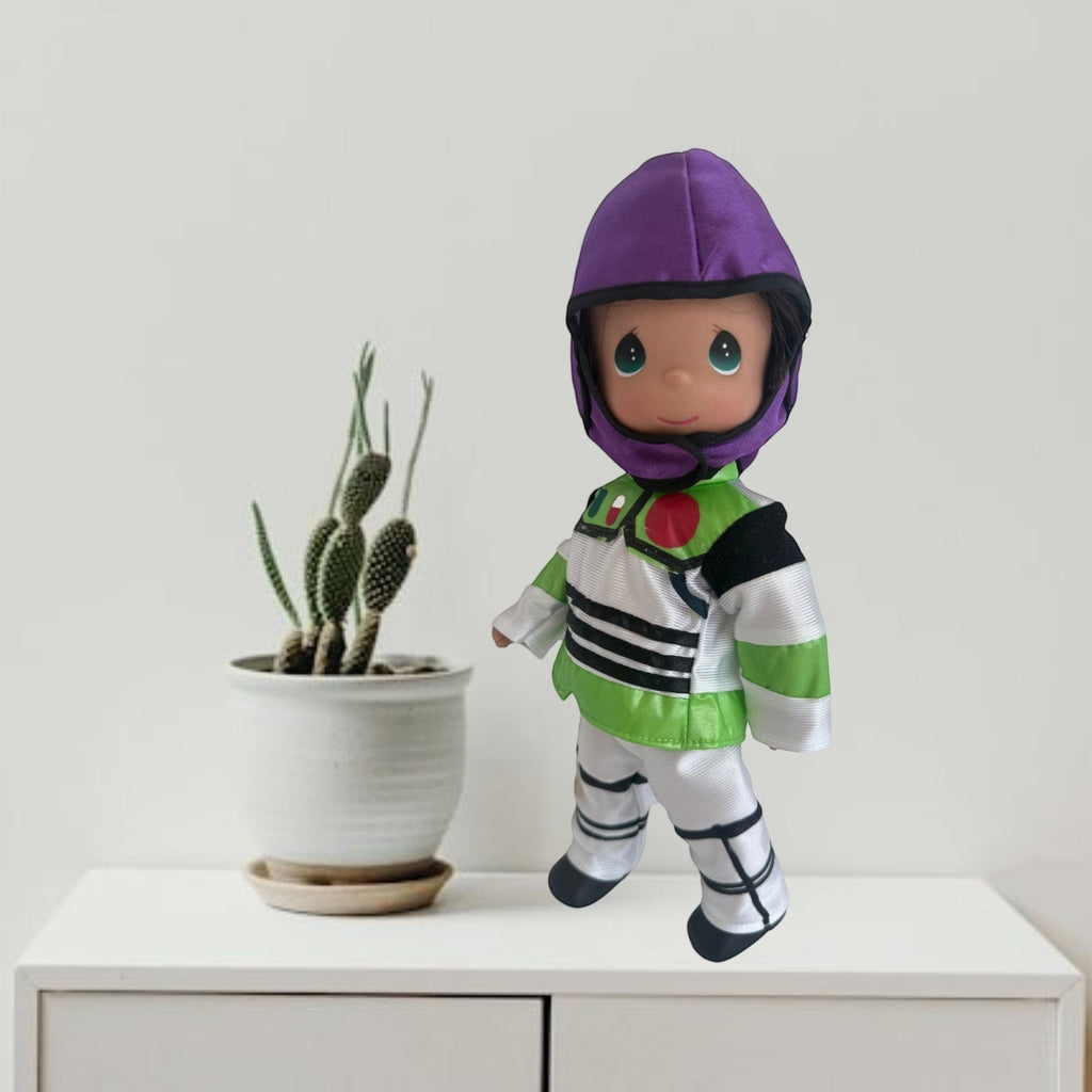 The Doll Maker 12-inch Buzz Lightyear vinyl doll wearing a signature white, green, and purple space ranger suit.