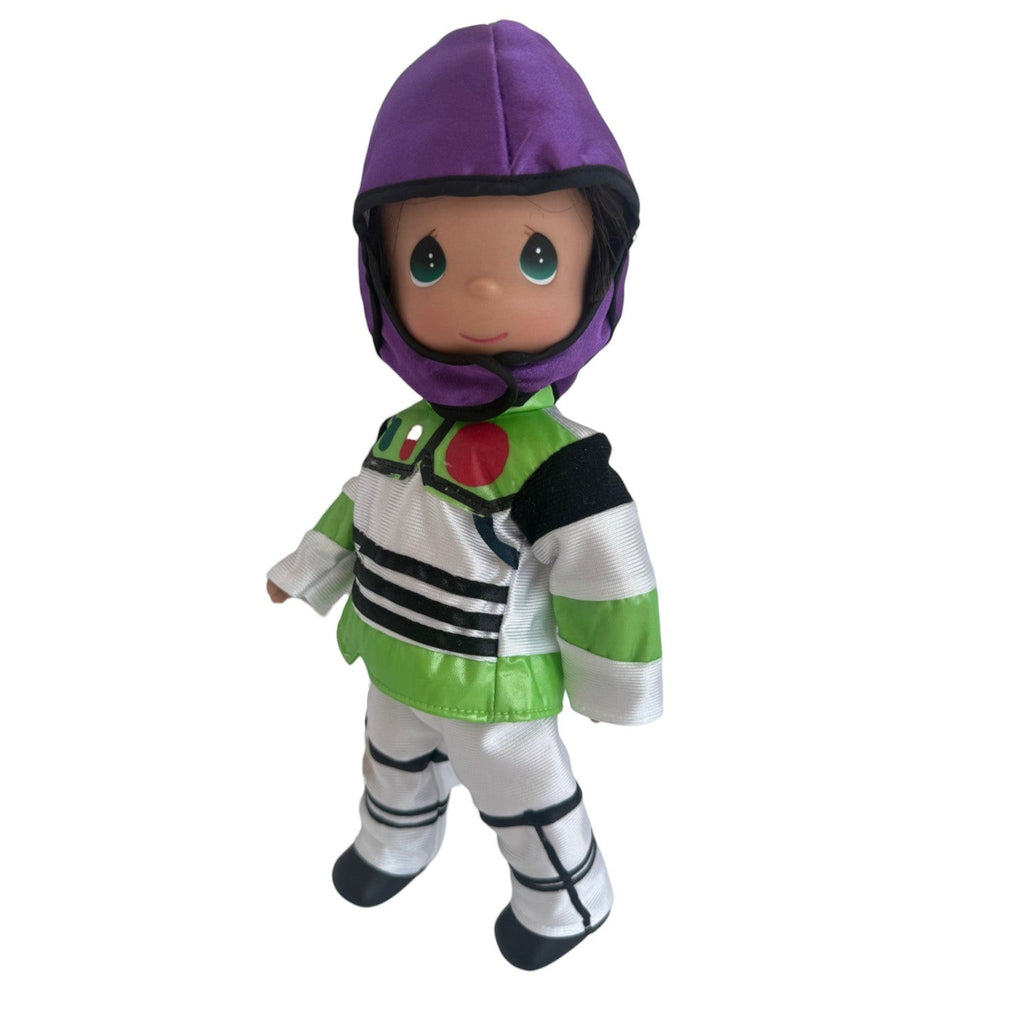 The Doll Maker 12-inch Buzz Lightyear vinyl doll wearing a white, green, and purple space ranger suit and helmet.