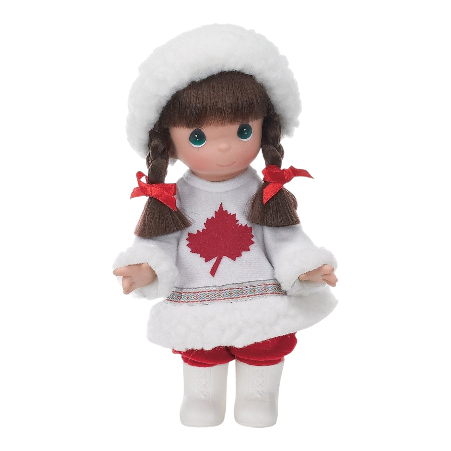 The Doll Maker 9-inch Canada vinyl doll wearing a white faux fur hat, sweater with red maple leaf, and red trousers.