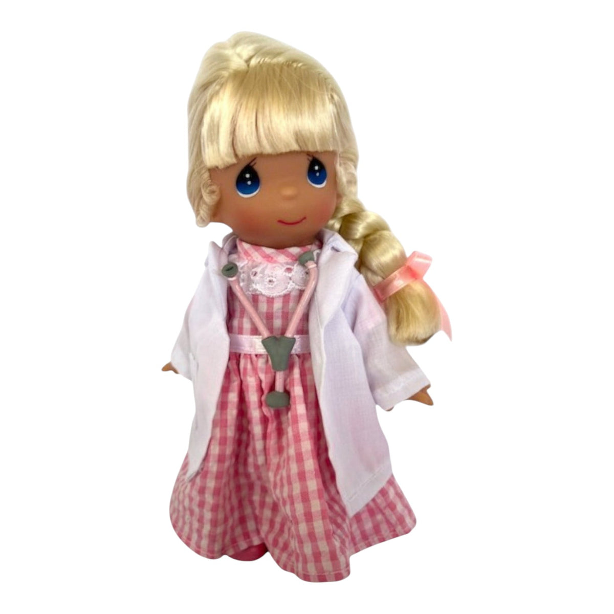 The Doll Maker 7-inch Caring Heart doctor doll with blonde hair, pink gingham dress, and white lab coat with stethoscope