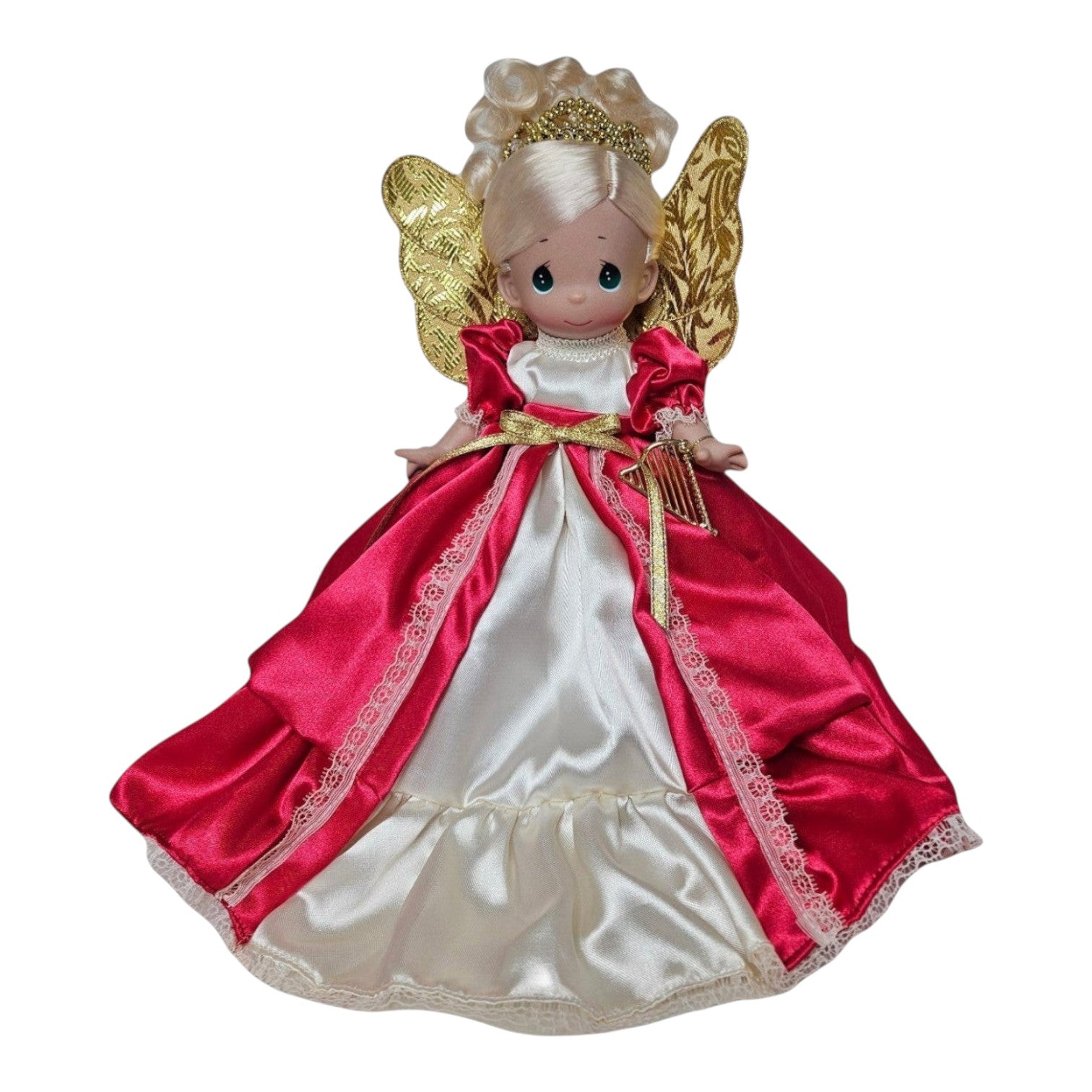The Doll Maker 12-inch Christmas Love tree topper featuring a blonde angel doll in a red and white satin gown.