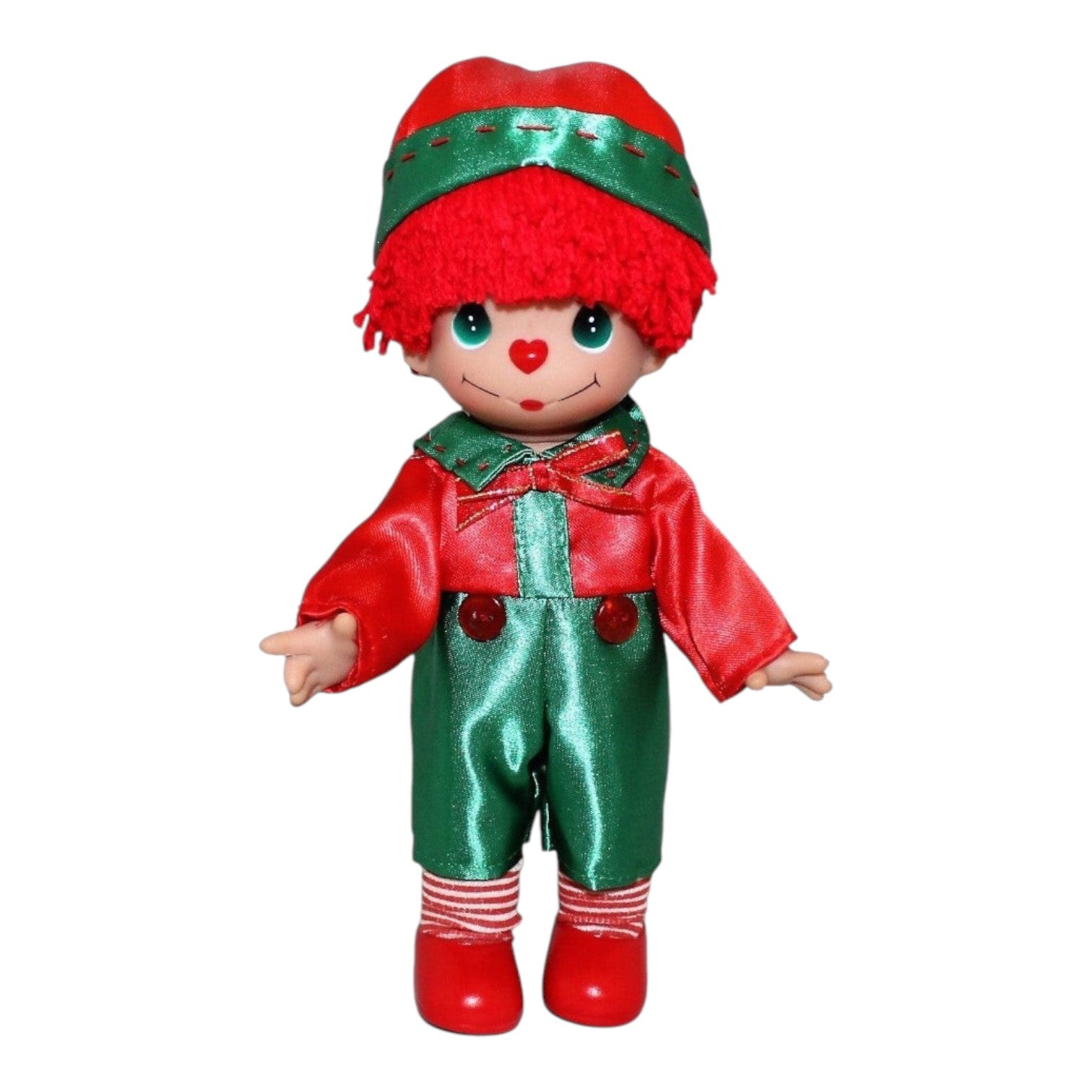 The Doll Maker 9-inch Christmas Wishes Raggedy Andy vinyl doll in a festive red and green elf-inspired outfit.
