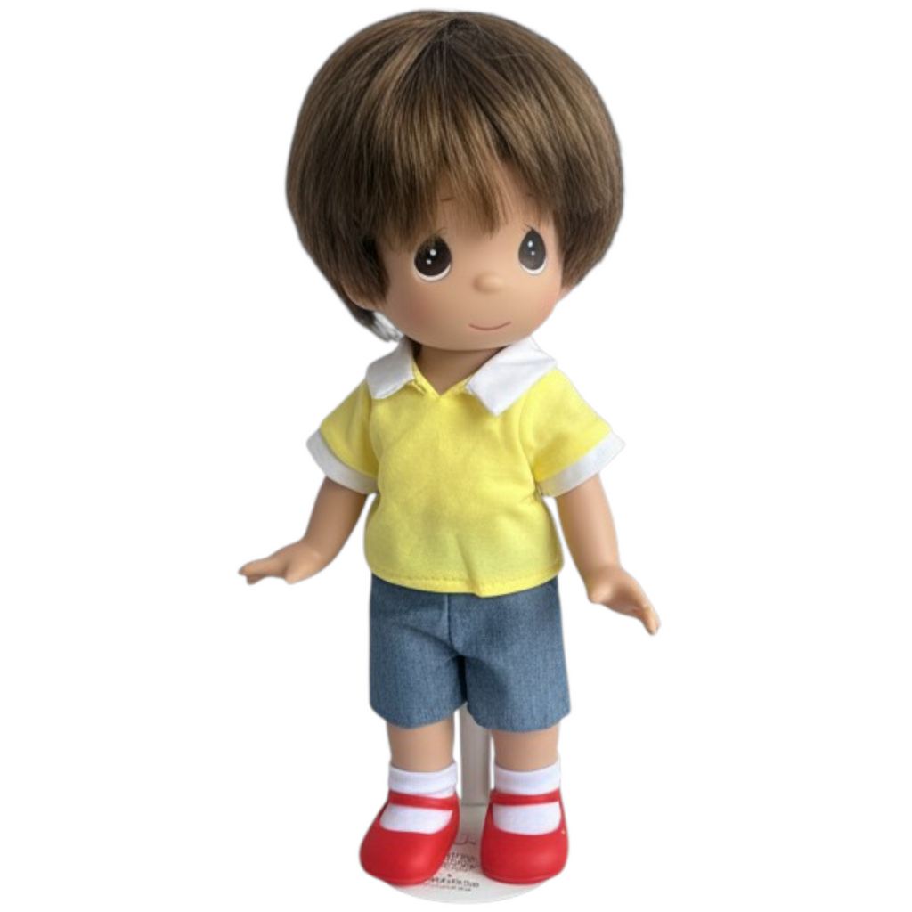 The Doll Maker 12-inch Christopher Robin collectible doll from the Winnie the Pooh series with brown hair.