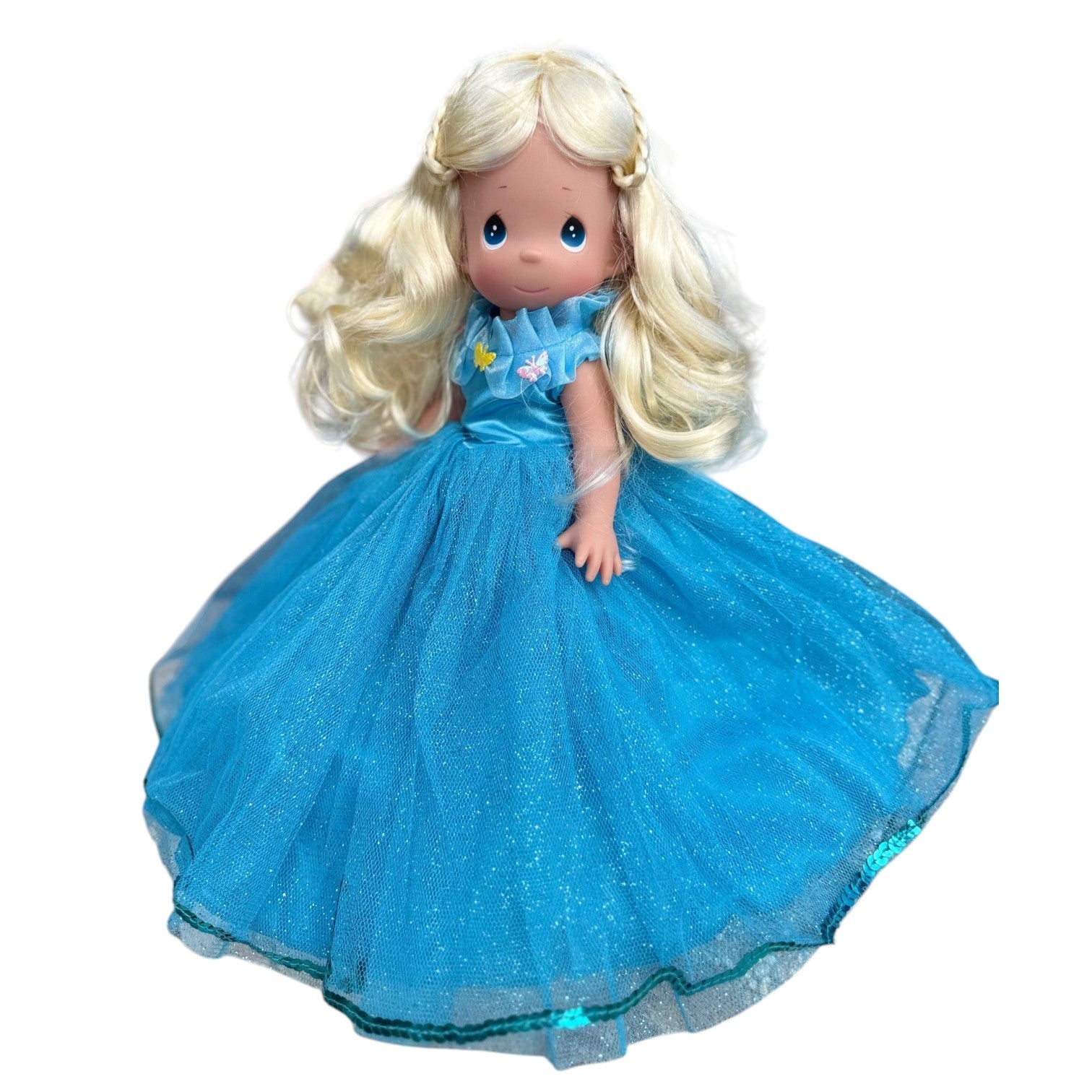 The Doll Maker 12-inch Cinderella doll with blonde hair and a sparkling blue tulle gown featuring butterfly accents.