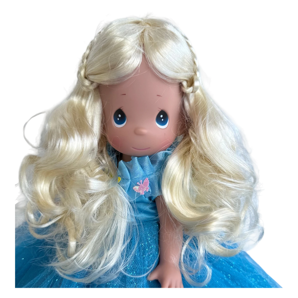 The Doll Maker 12-inch Cinderella doll with blonde hair and a blue butterfly dress signed by Linda Rick