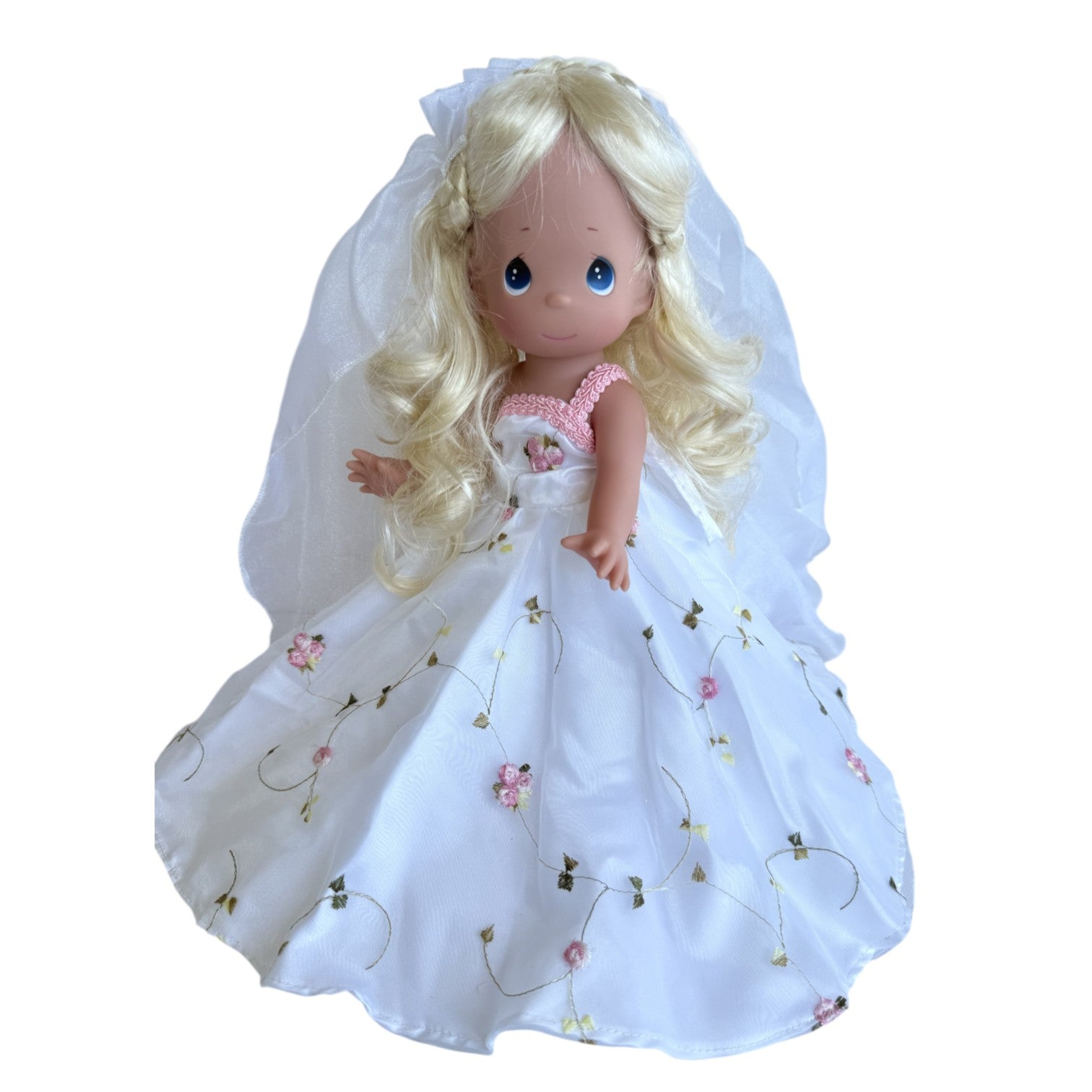 The Doll Maker 12 inch Cinderella doll wearing a white wedding dress with delicate pink floral embroidery and veil