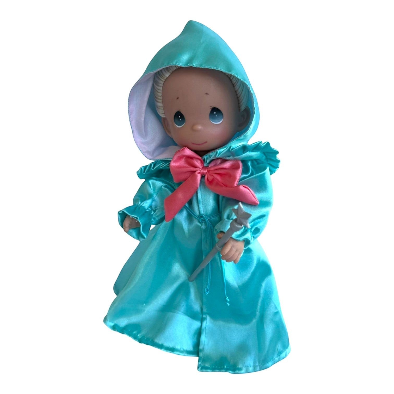 The Doll Maker 12-inch Fairy Godmother doll wearing a shiny turquoise hooded cloak with a pink bow and holding a wand