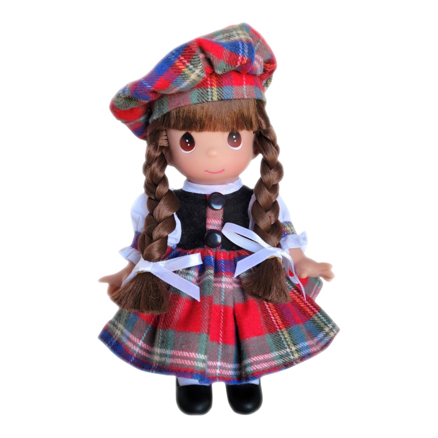 The Doll Maker Fiona 9-inch vinyl doll wearing a traditional Scottish tartan dress and matching tam o' shanter hat.
