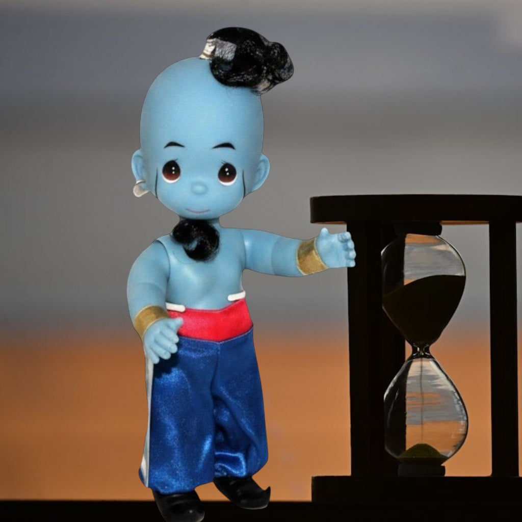 The Doll Maker 12-inch Genie doll from Aladdin with blue skin, black hair, and satin pants standing by an hourglass.
