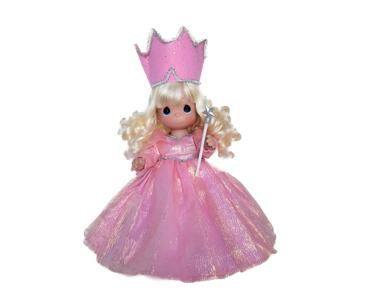 The Doll Maker 12-inch Glinda the Good Witch vinyl doll in a pink gown with a matching crown and star wand.