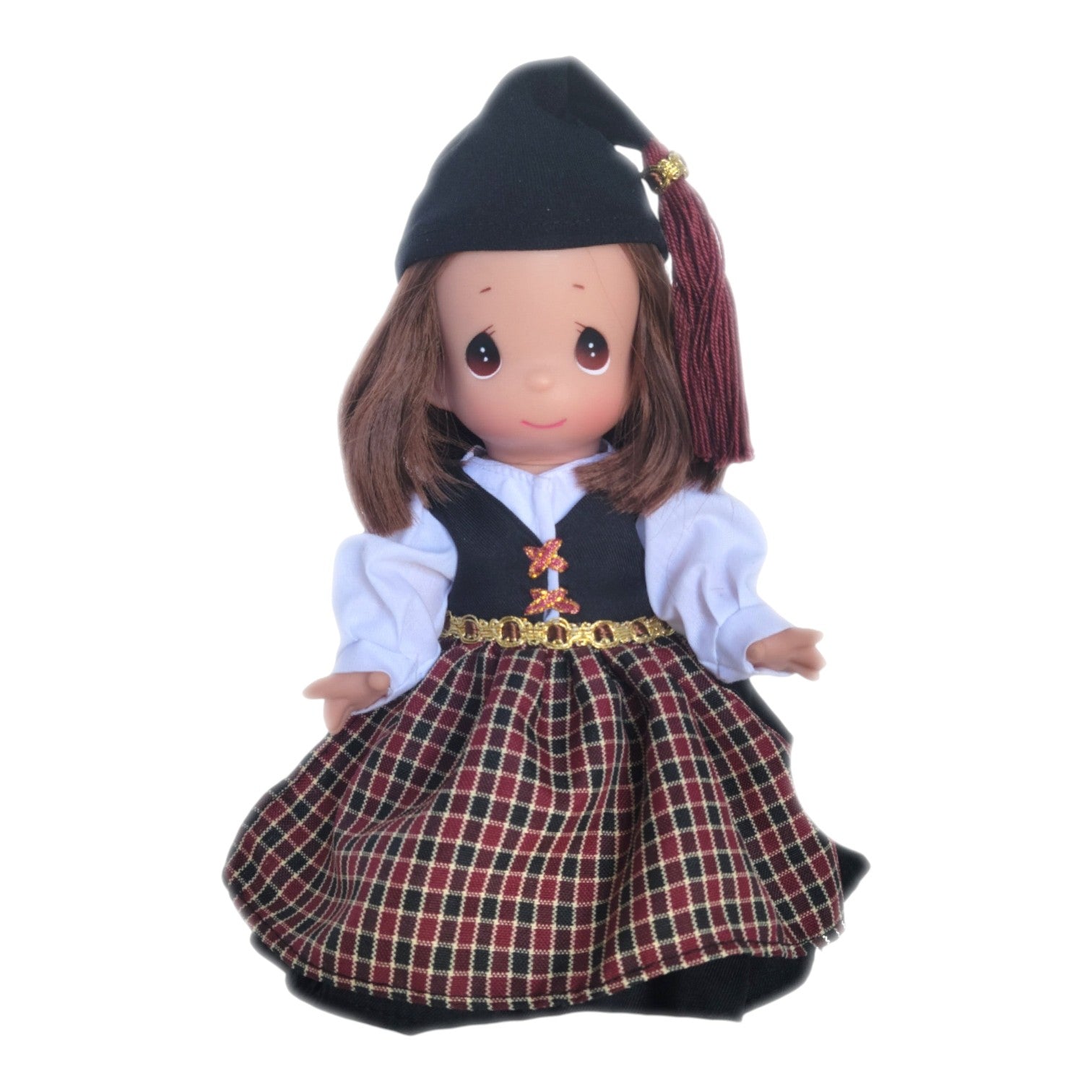 The Doll Maker 9-inch Freyja doll from Iceland wearing a traditional costume with a black cap and plaid skirt.