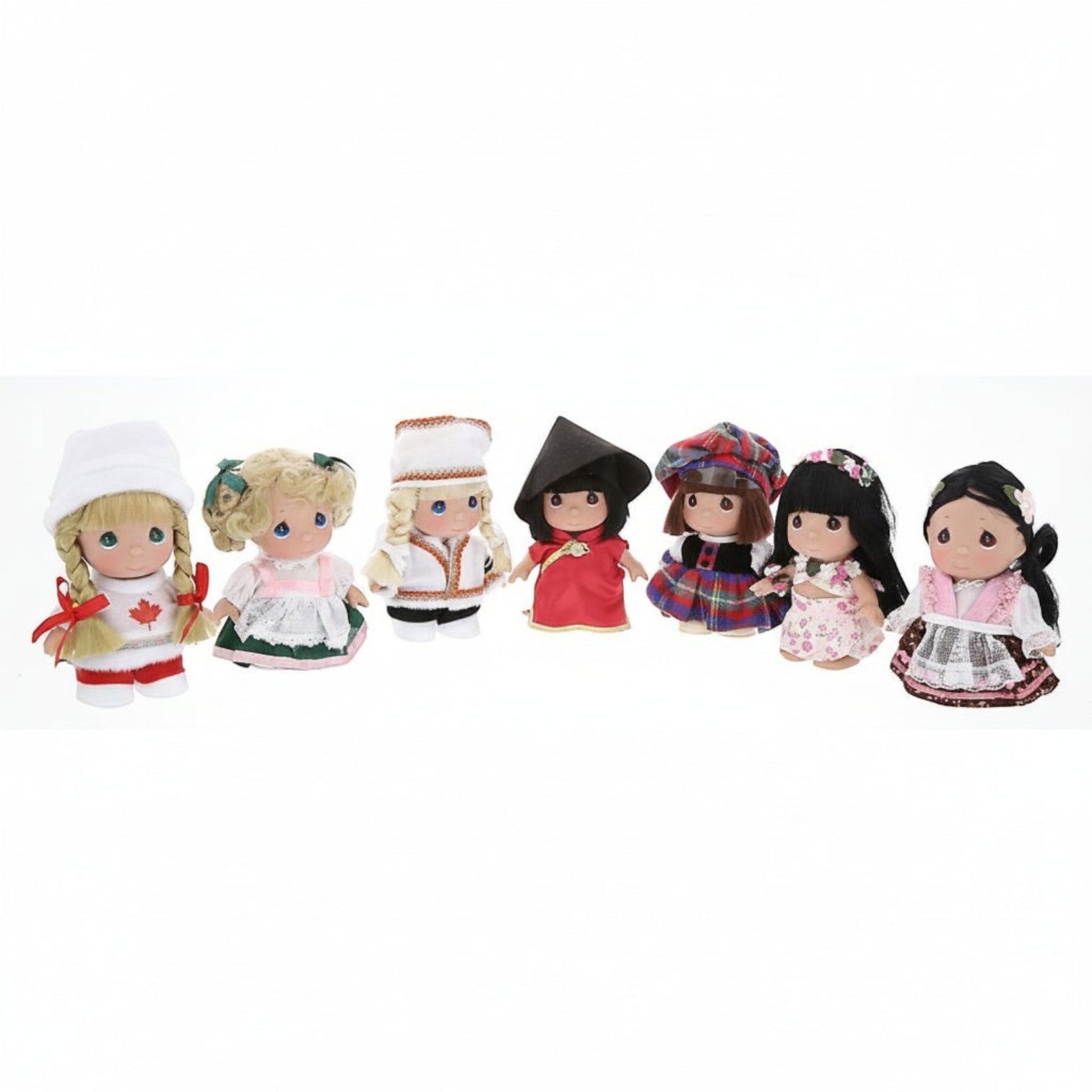 The Doll Maker 5-inch doll set featuring 7 international dolls in traditional cultural outfits from around the world.