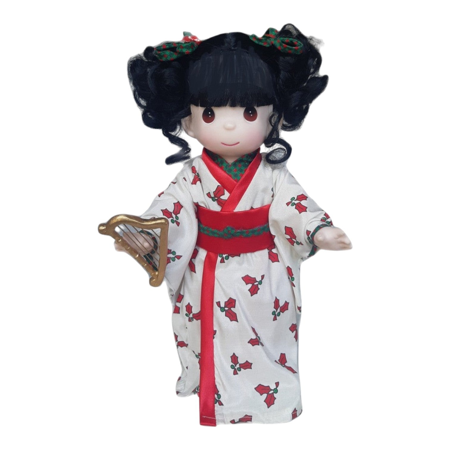 The Doll Maker 12-inch Japanese Mikoto doll wearing a white kimono with holly print, red obi, and holding a small harp