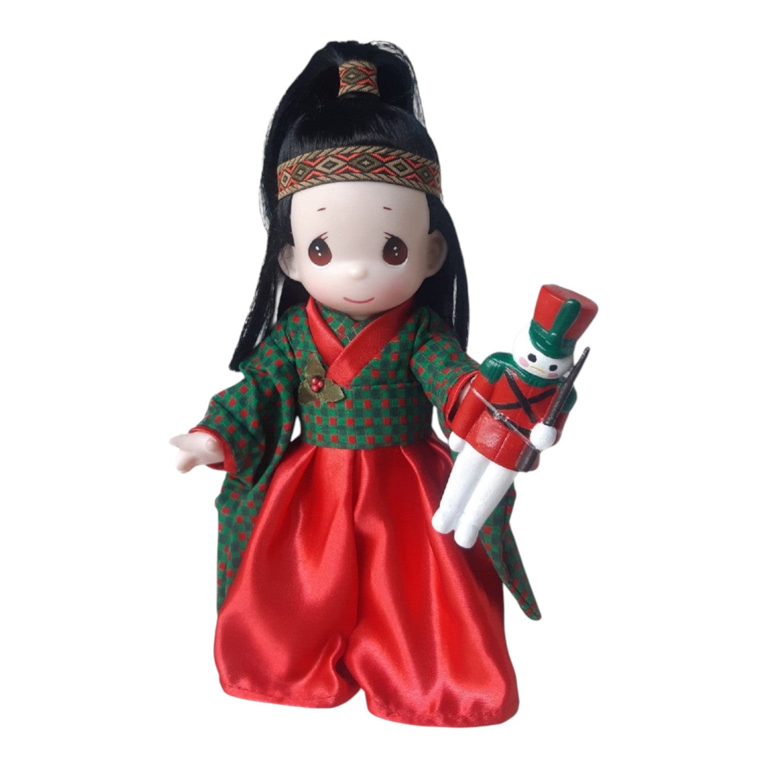 The Doll Maker 9-inch Japanese Takurou doll wearing a red and green checkered kimono holding a toy soldier