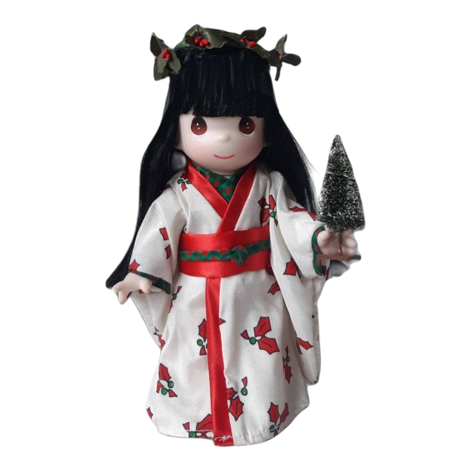 The Doll Maker 9-inch Japanese Yukie doll wearing a white kimono with holly print and a festive holly headpiece
