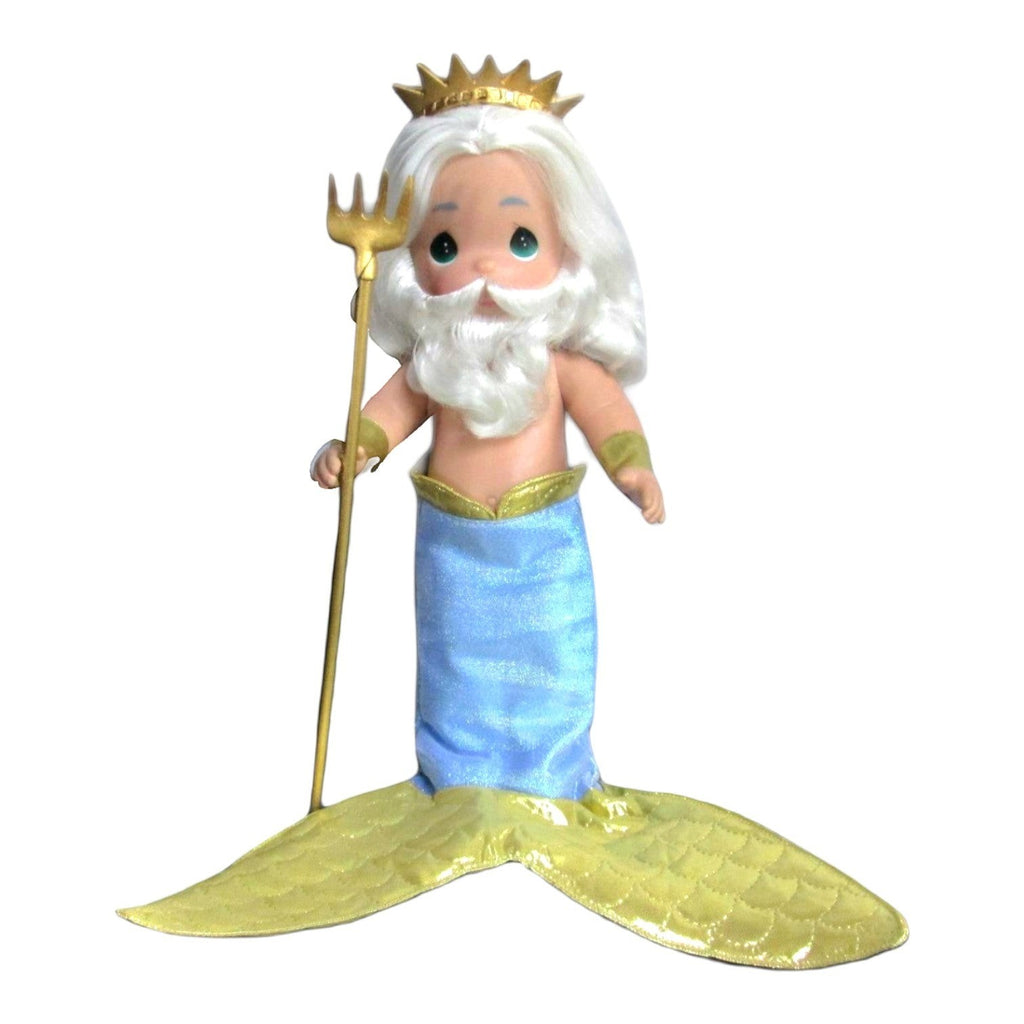 The Doll Maker 12-inch King Triton vinyl doll with white hair, gold crown, trident, and blue and gold mermaid tail.