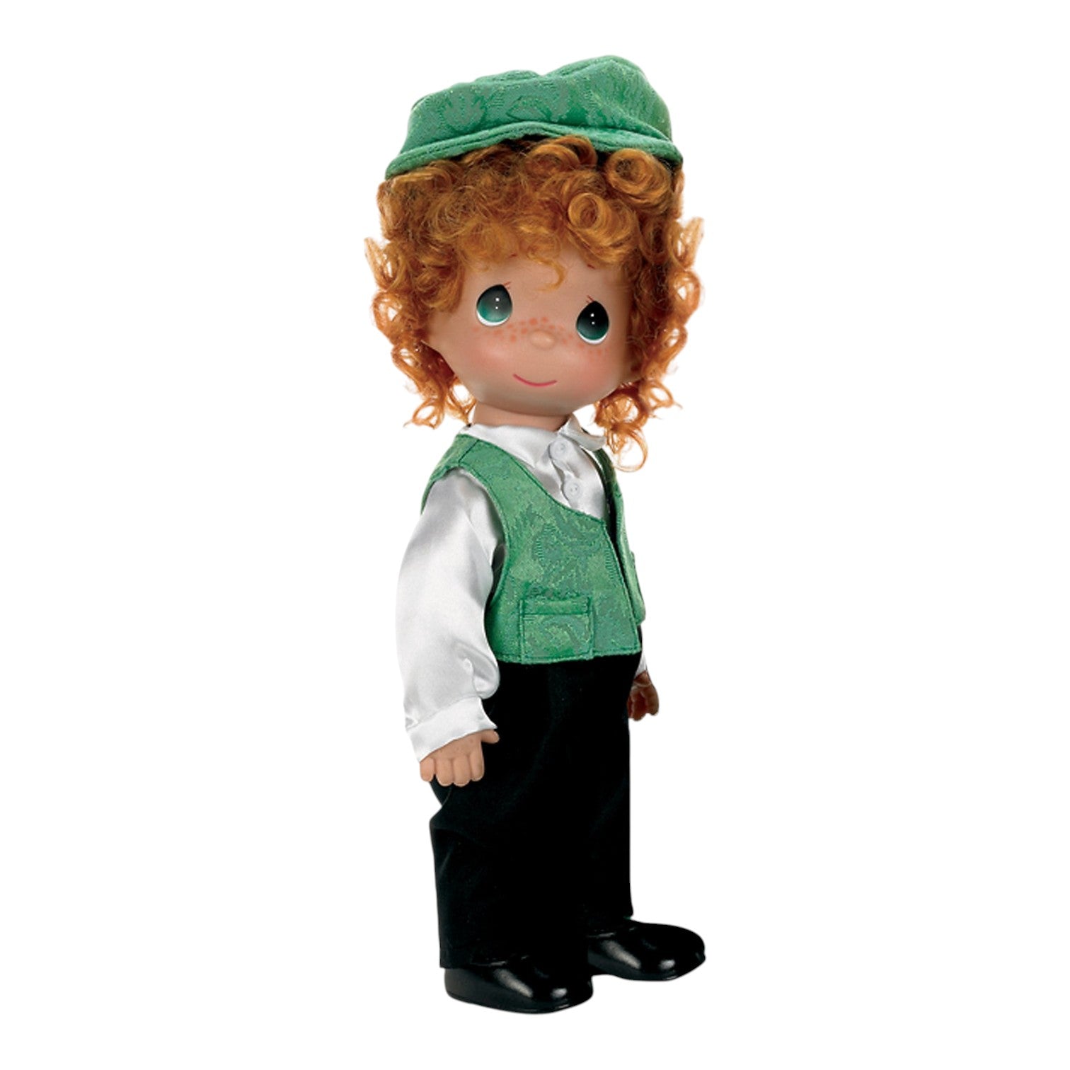 The Doll Maker Kyle 9-inch vinyl doll wearing a traditional green Irish costume with a matching cap and black trousers.