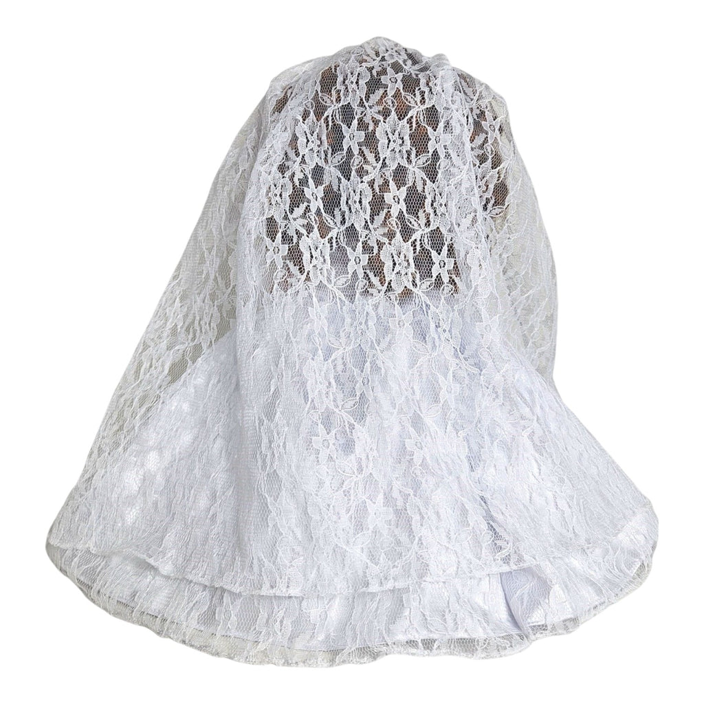 The Doll Maker Fairytale Come True bride doll wearing a white lace wedding dress and matching veil