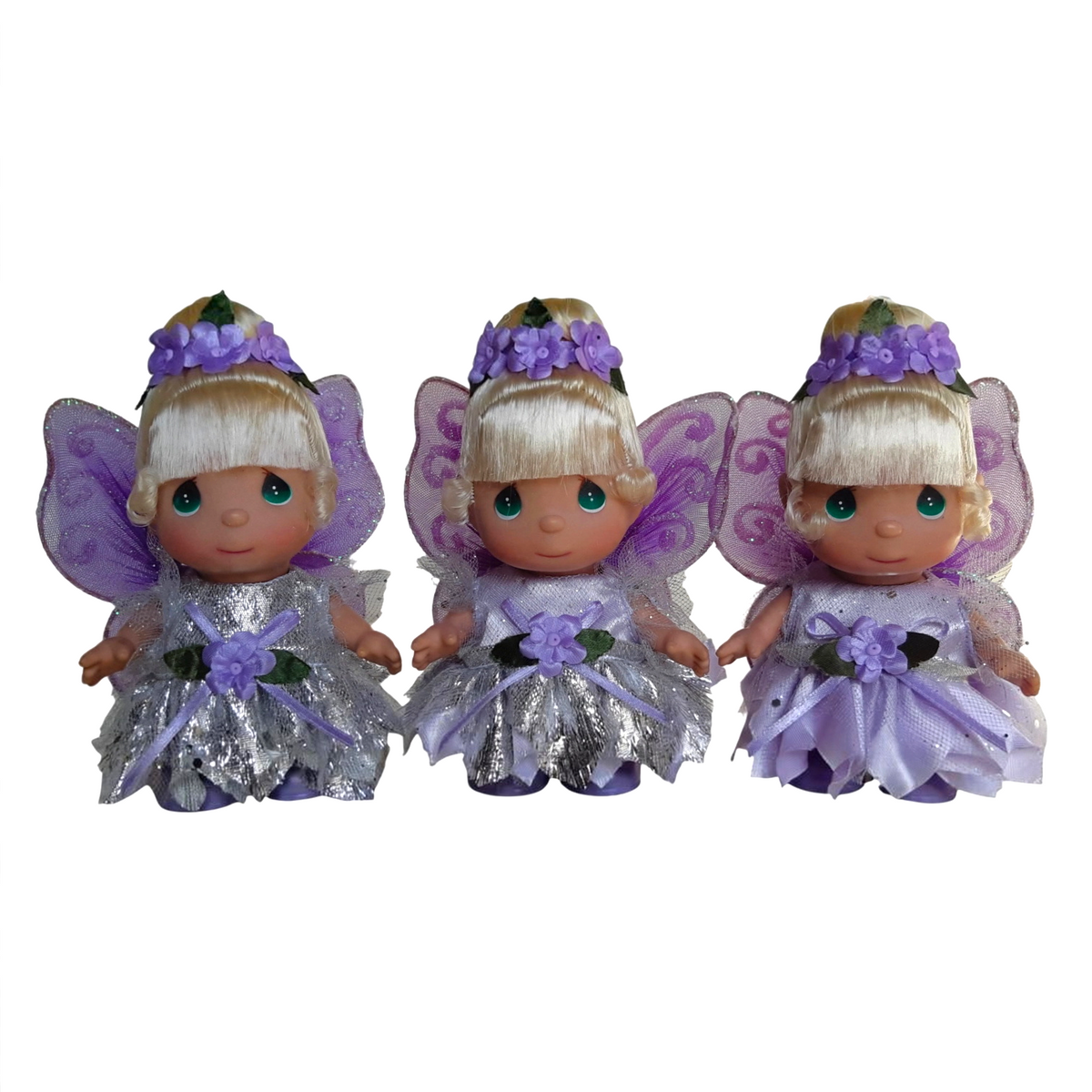 The Doll Maker Lavender Mini Tinker Bell set of three 5-inch fairy dolls with silver dresses and floral headbands.