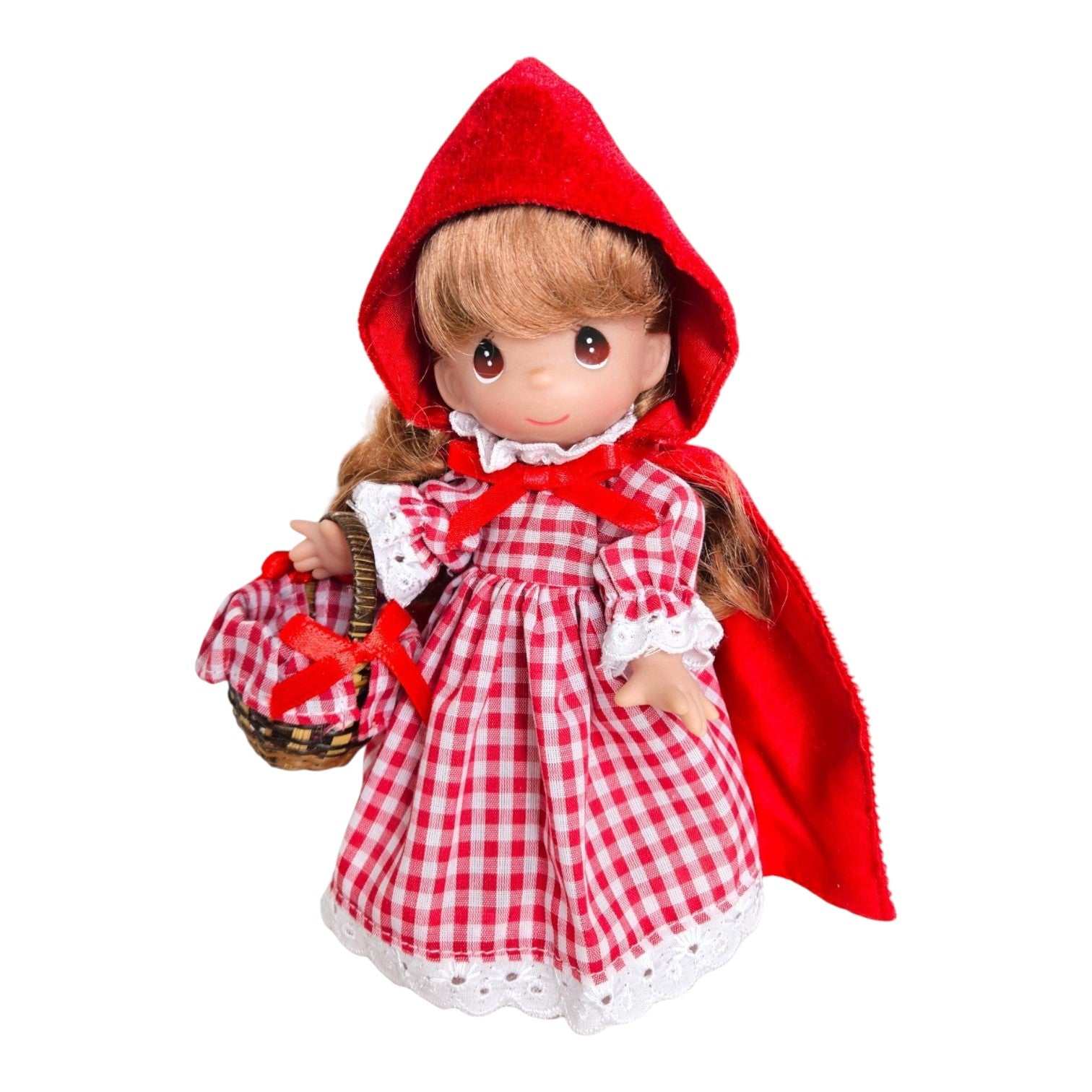 The Doll Maker Lil Red Riding Hood 7-inch vinyl doll wearing a red hooded cape and a red gingham dress with a basket.