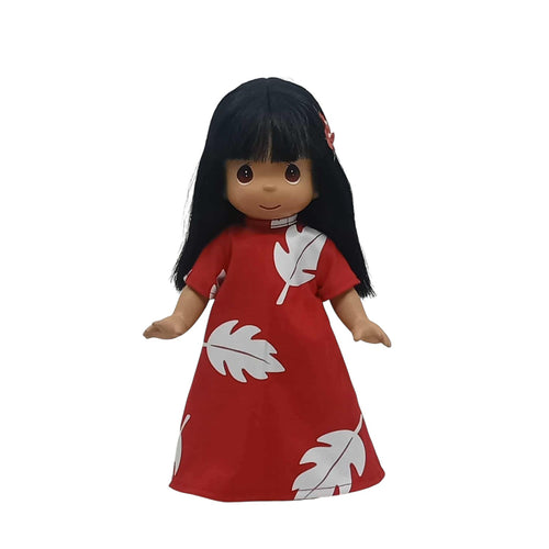 The Doll Maker 12-inch Lilo collectible doll wearing a red dress with white leaf print and black hair.