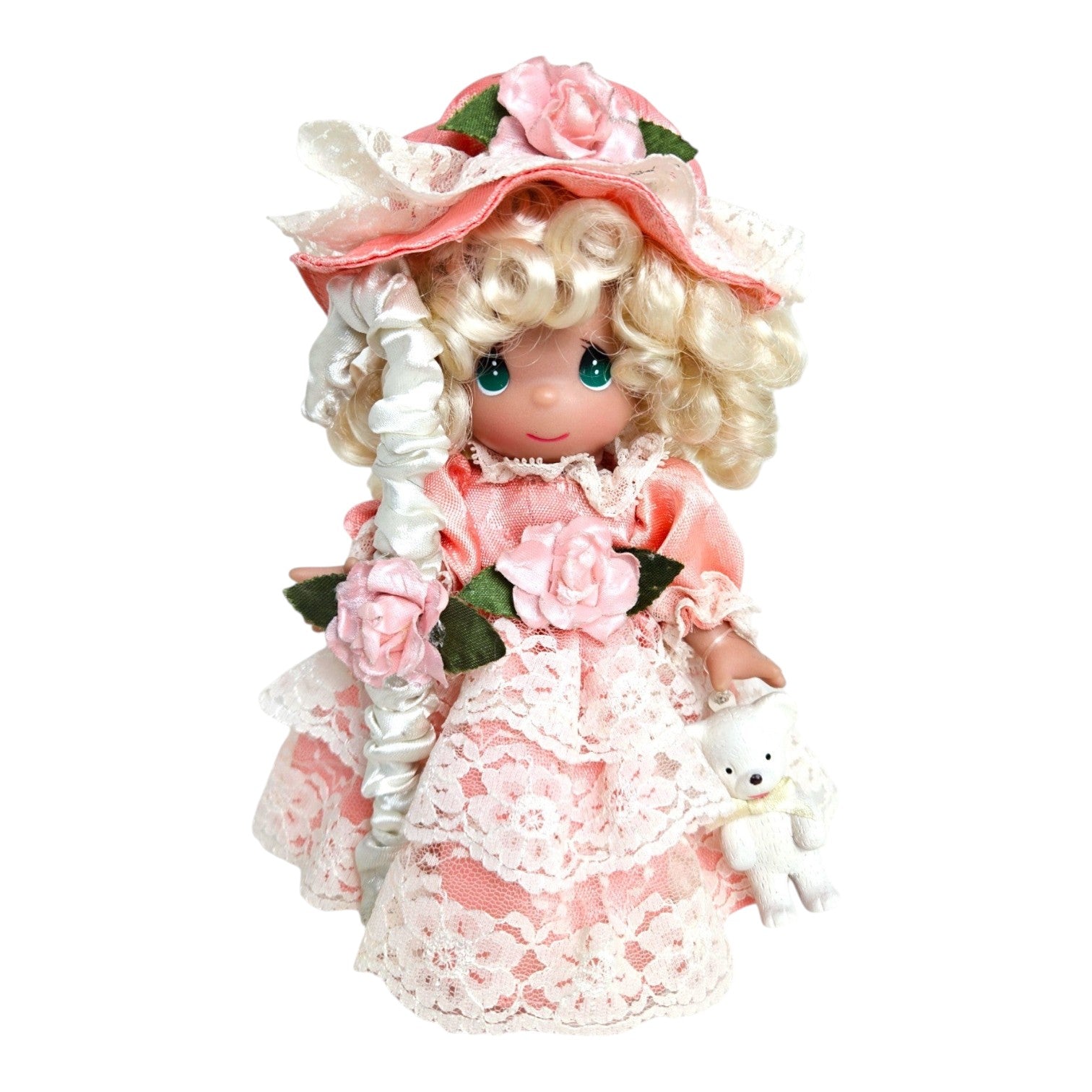 The Doll Maker 7-inch Little Bo Peep vinyl doll in a pink lace dress with a matching bonnet, staff, and teddy bear.